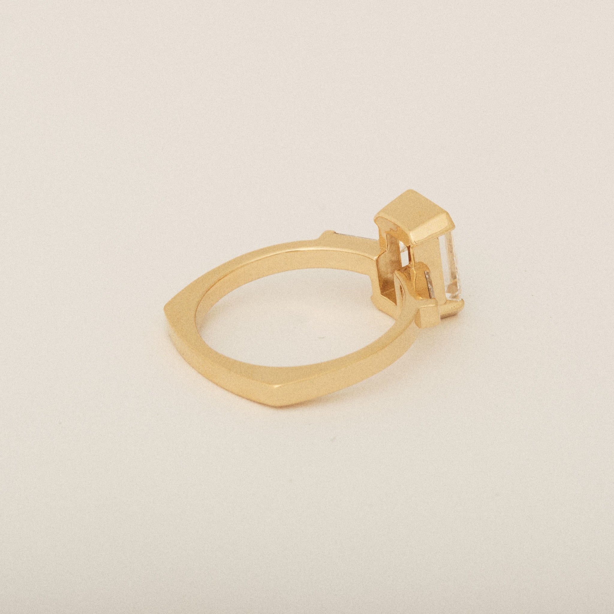 Emerald Cut Diamond Half Bezel Set with Two Baguette Sides Engagement Ring