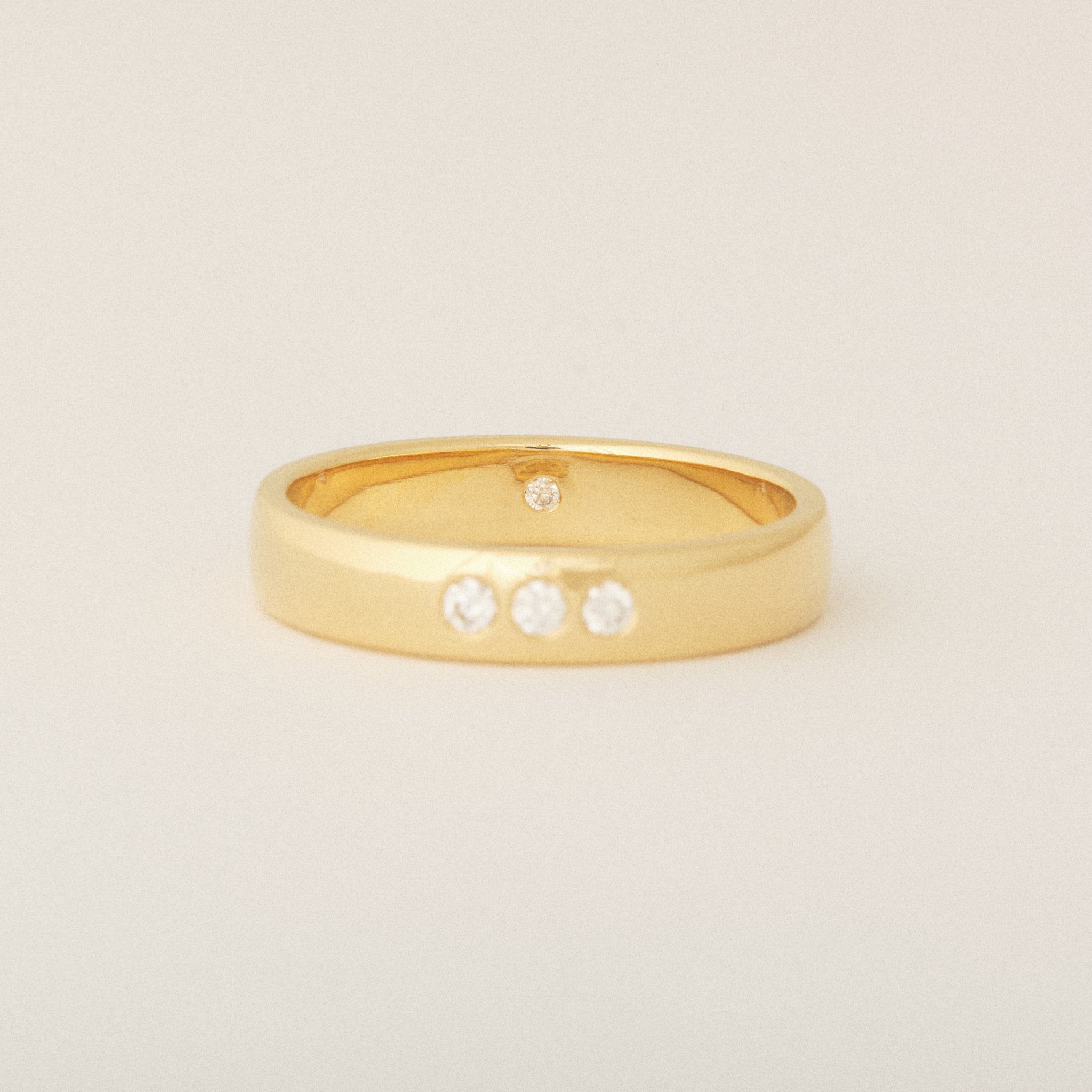 Heirloom Three Diamond Exterior and One Round Diamond Interior 14k Yellow Wedding Band