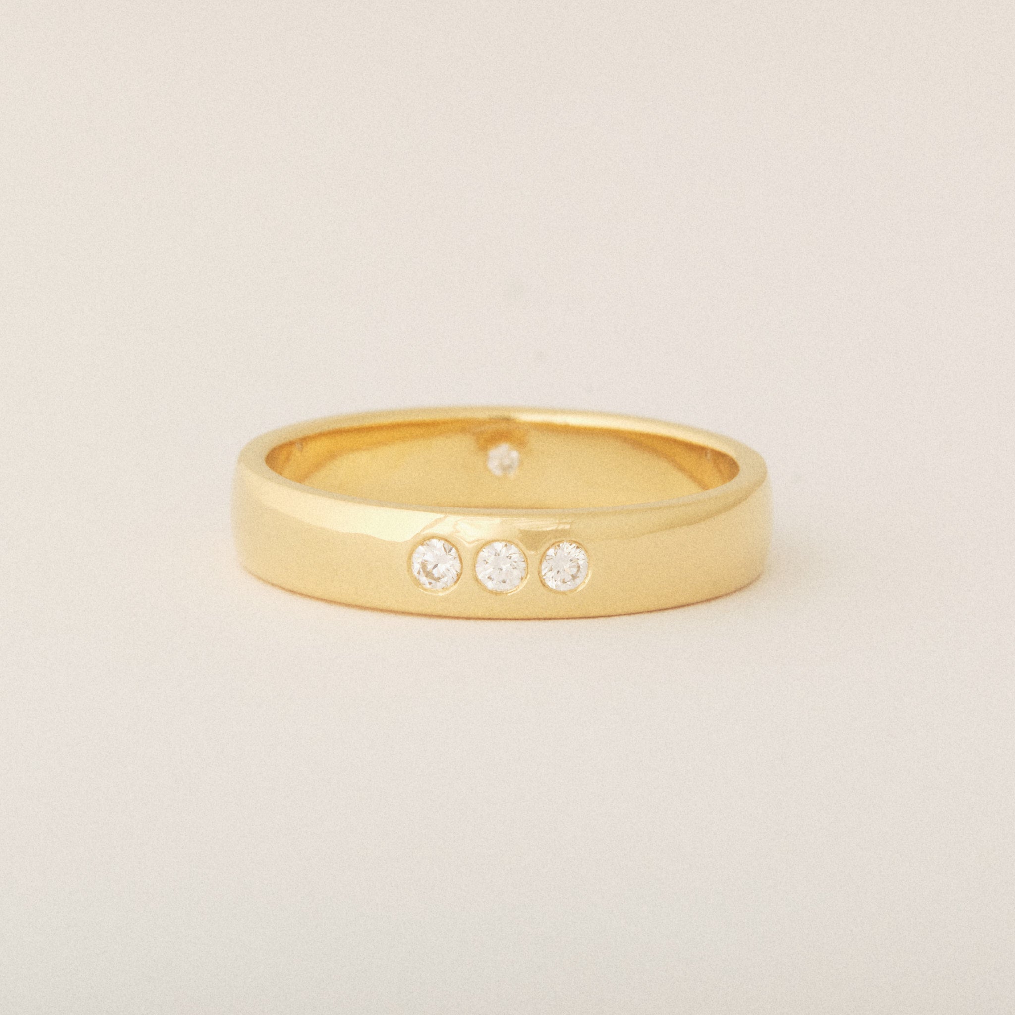 Heirloom Three Diamond Exterior and One Round Diamond Interior 14k Yellow Wedding Band