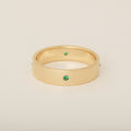 Men's Wedding Band with Four Round Emeralds Flush Set