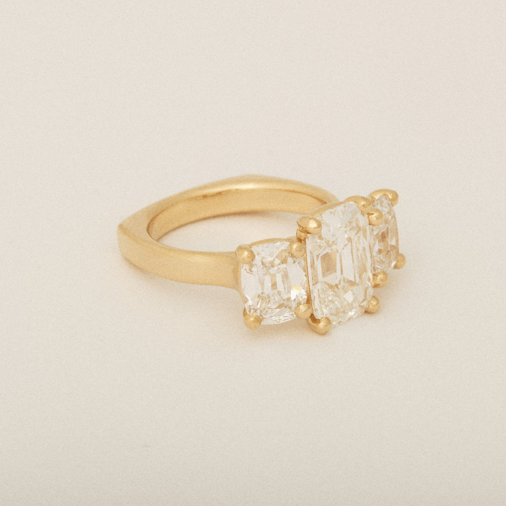 Elongated Old Mine Cut Three Diamond Engagement Ring with a Euro Shank