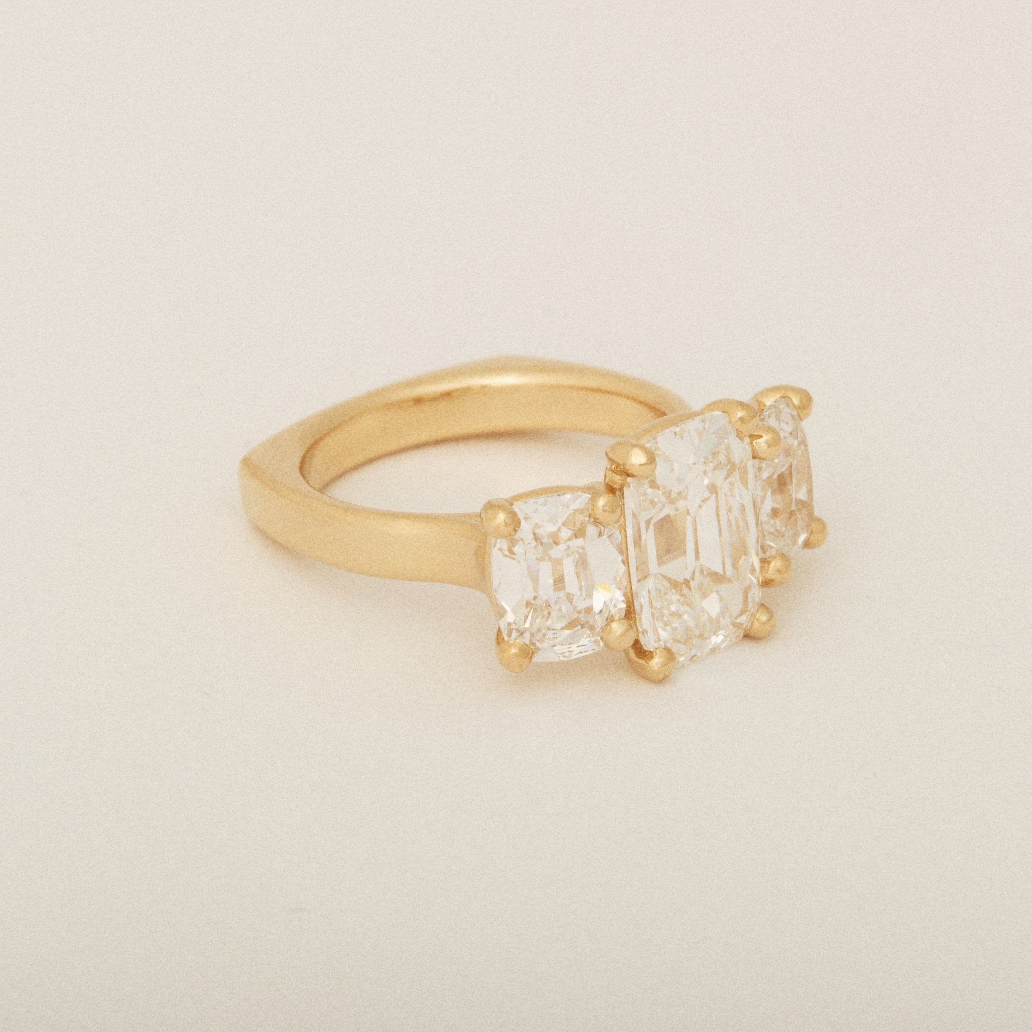 Elongated Old Mine Cut Three Diamond Engagement Ring with a Euro Shank