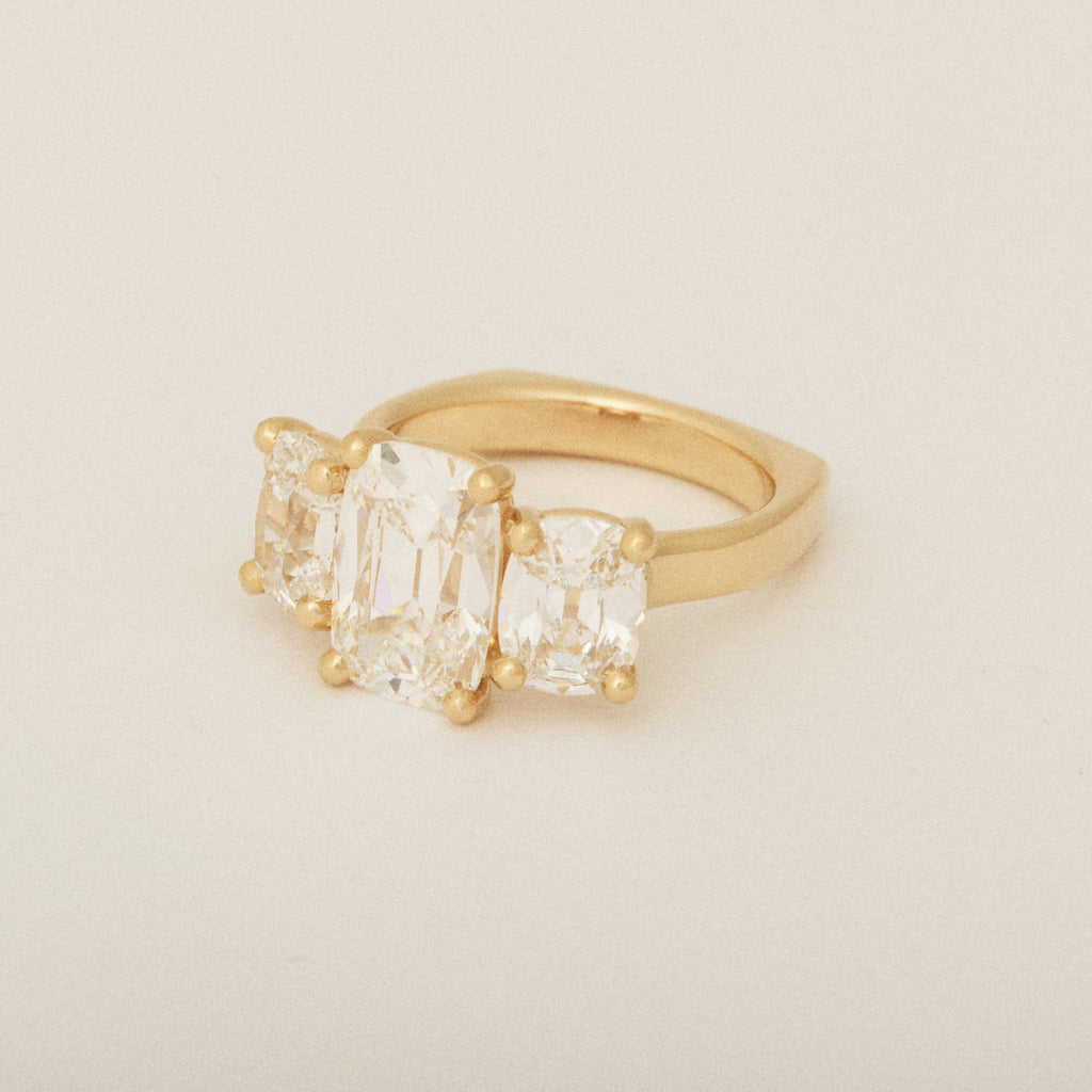 Elongated Old Mine Cut Three Diamond Engagement Ring with a Euro Shank
