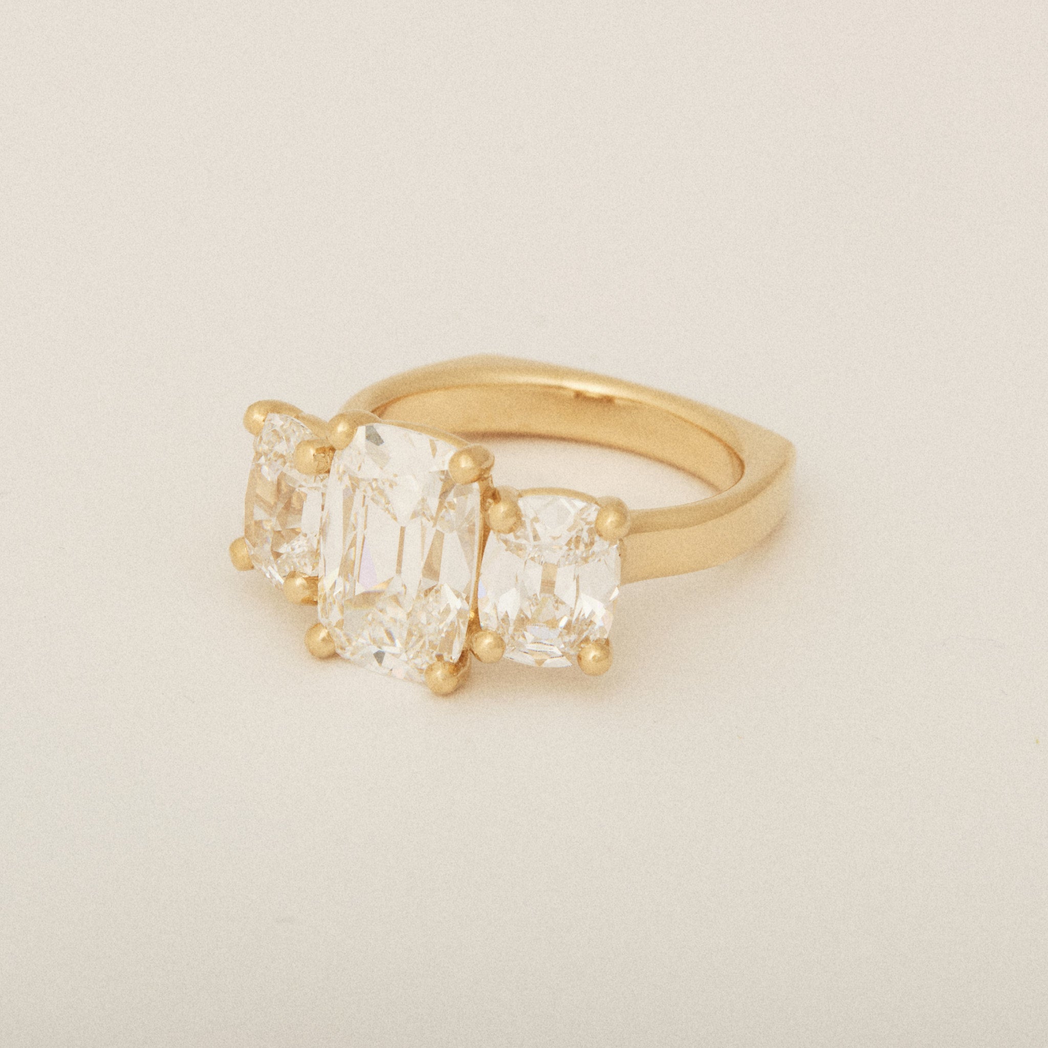 Elongated Old Mine Cut Three Diamond Engagement Ring with a Euro Shank