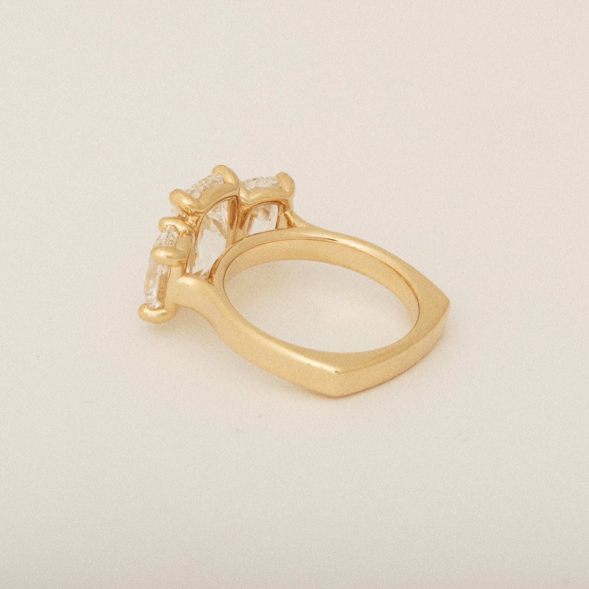 Elongated Old Mine Cut Three Diamond Engagement Ring with a Euro Shank
