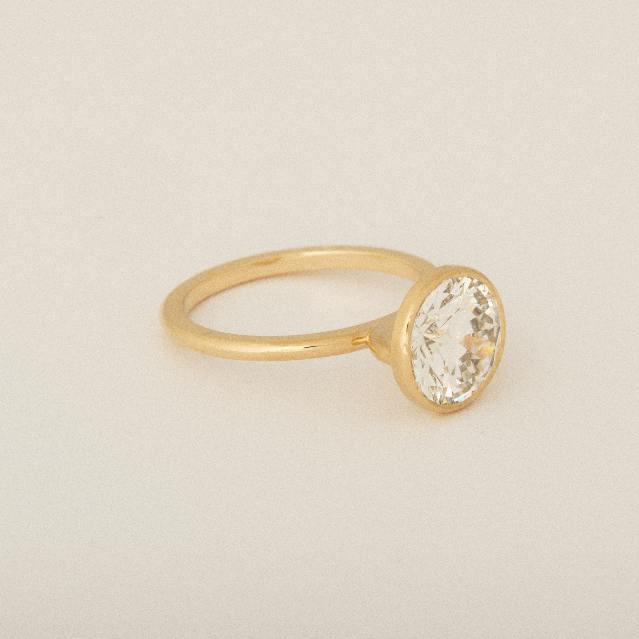 Thin Bezel Set Round Diamond Perfectly Flush Engagement Ring
